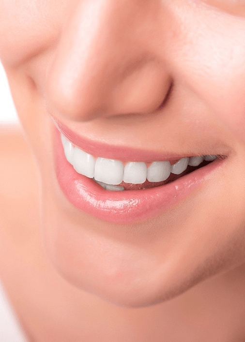 closeup of young woman smiling 