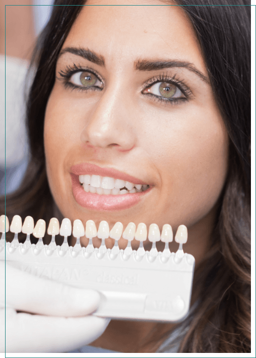 Woman getting veneers from her cosmetic dentist in Boise