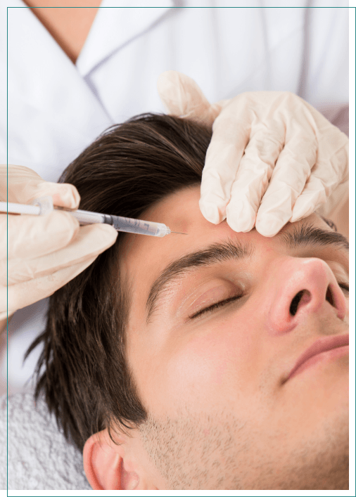 Man getting a Botox injection in his forehead