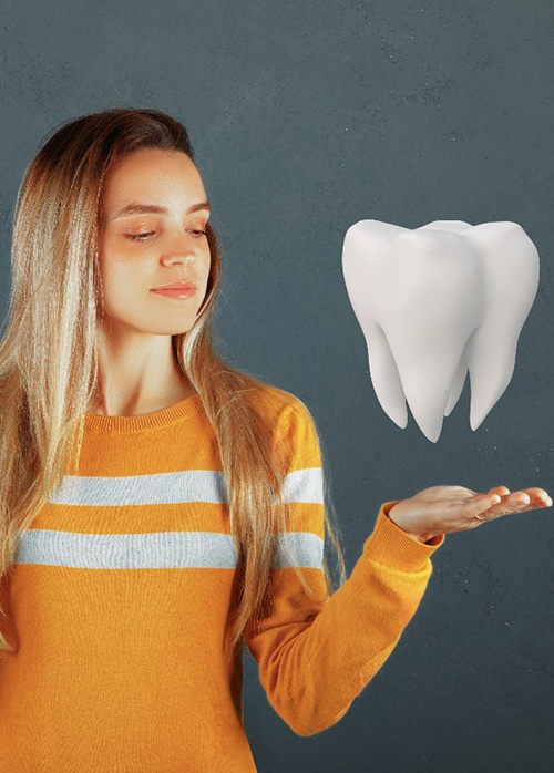 woman weighing a piggy bank and a tooth