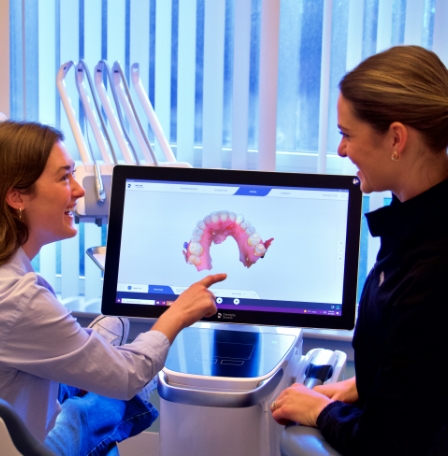 Cone beam scanner against white wall of dental office