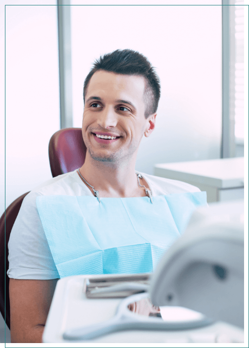 Man sitting in dental chair in Boise dental office