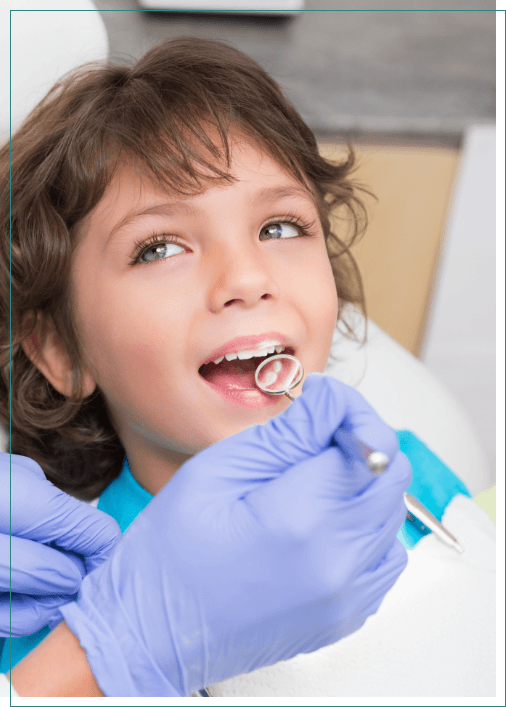 Young child receiving a dental exam